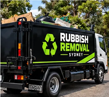 Rubbish Removal Sydney truck loaded with furniture, green waste and building rubbish